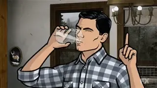 The main character from the show Archer holding up one finger while guzzling down a glass of water to stall for time.